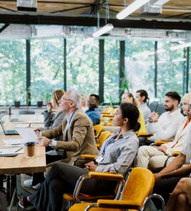 Cinematic image of a conference meeting.