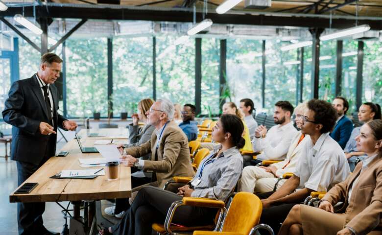 Cinematic image of a conference meeting.